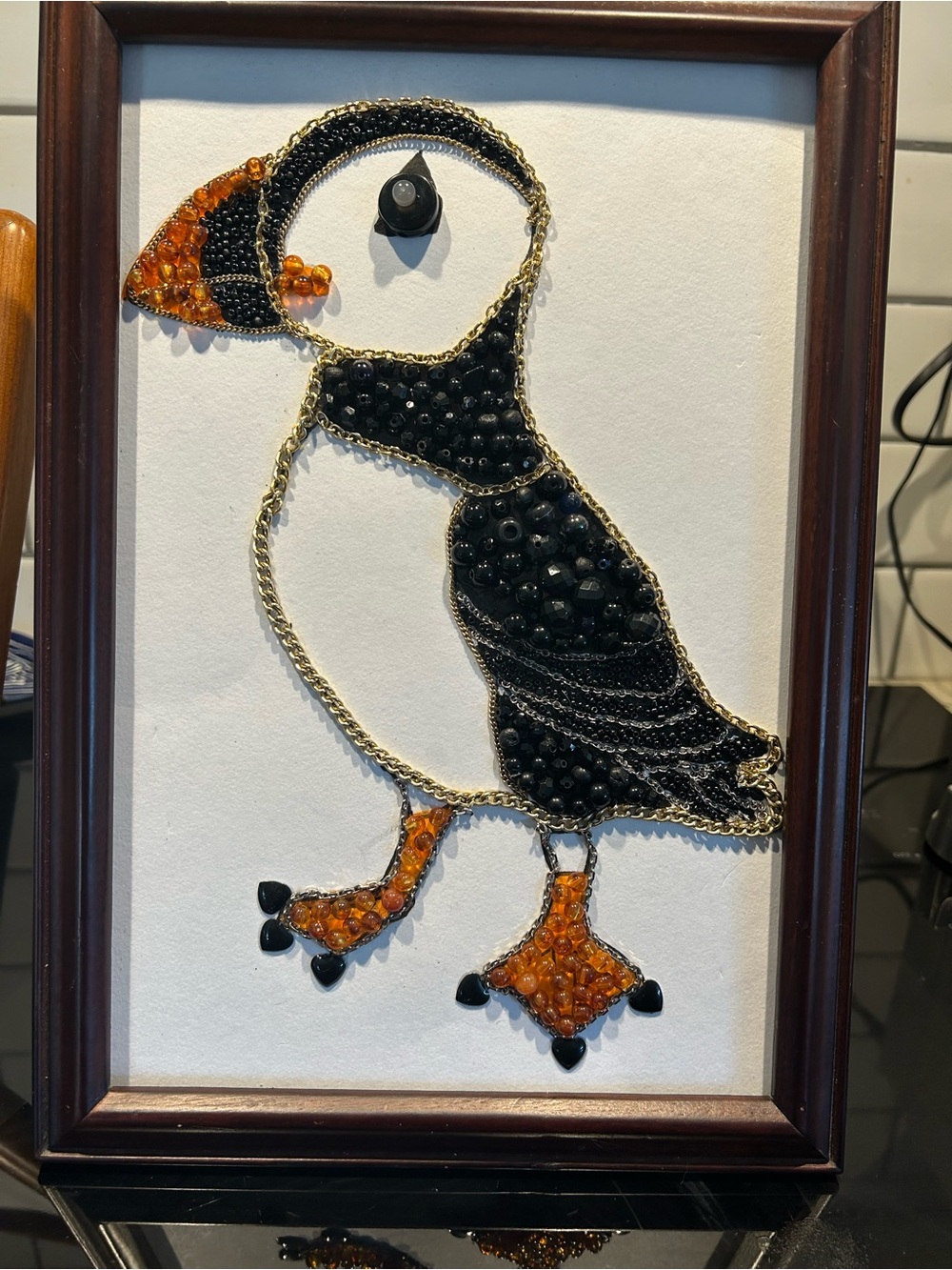 Handcrafted Puffin Wall Art - Black and Orange Bead Design